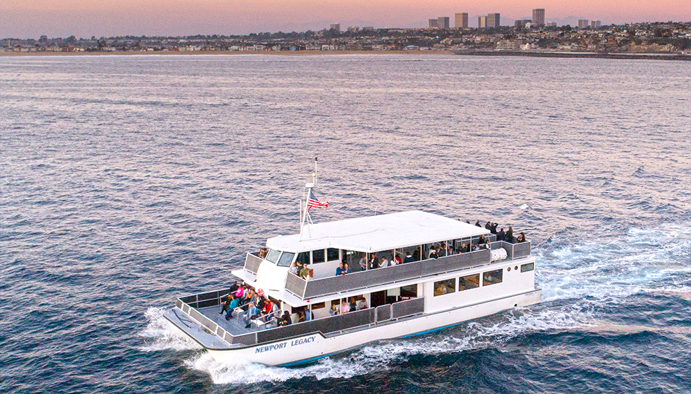 The Newport Legacy, a Burial At Sea vessel, sails on the Pacific Ocean of Southern California.